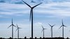 Windmills representing innovative materials for energy conversion and storage technologies.