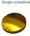 picture of a round gold single-crystalline sample.